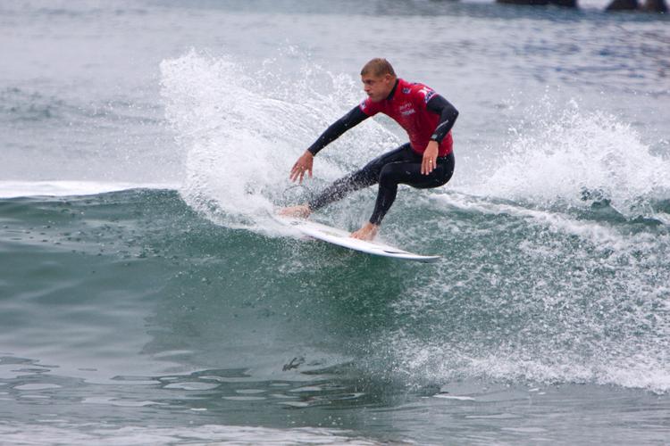 Kelly Slater Advances In Midst of Heavy Upsets at Day One of the Nike US Open of Surfing
