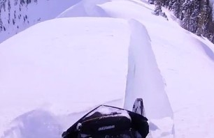 Must Watch - Snowmobiler Almost Dies on Scary Cornice