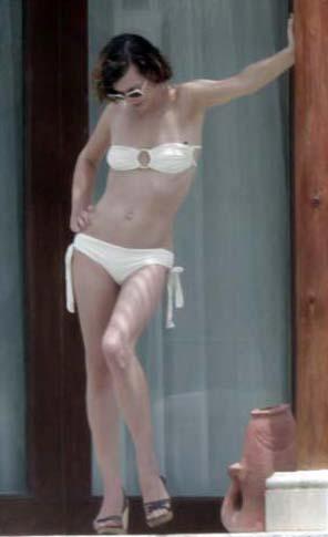 Mila Jovovich Loves the Beach Bikini Album