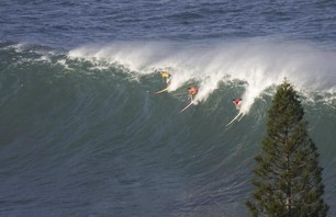 Michael Ho, Andy Irons and Peter Mel at the Quiksilver in Memory of Eddie Aikau.